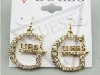 Daiktas Guess gold&crystal logo auskarai